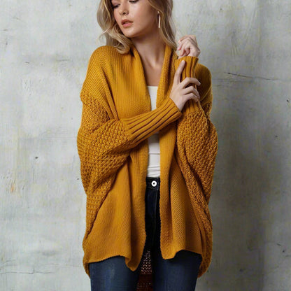 Trui met vleermuismouwen geel gebreid voorbeeld